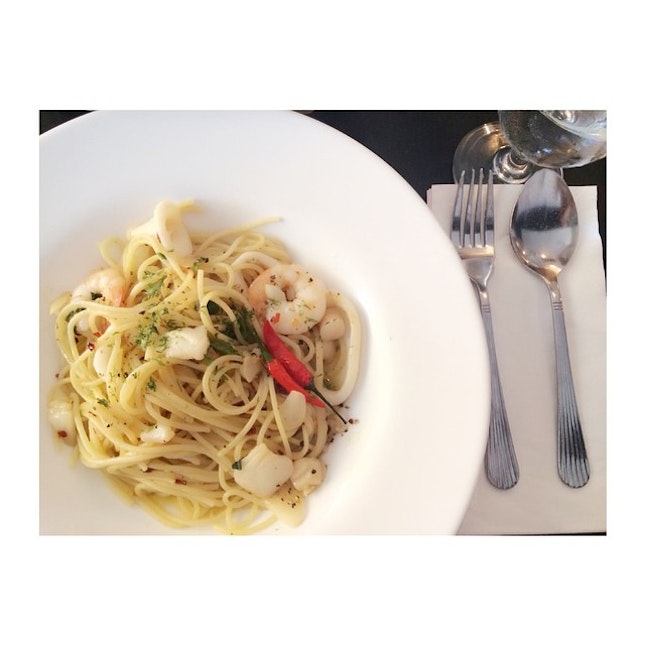 #lunch; Spaghetti Pasta ‘Aglio Olio’ with mixed Seafood and chopped Italian Parsley.