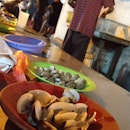 the shellfish (RM1.50/plate) are simply boiled and served with a homemade sauce