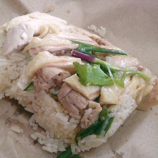 The super yummy hainanese chicken rice from the basement for the food centre!