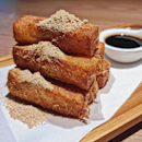 Egg Coated Glutinous Rice Rolls with Brown Sugar 