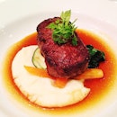 Australian beef tenderloin medium done with truffle based sauce, fine mash and spinach.