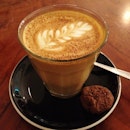 Flat white with a chocolate cookie