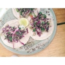 Fish tacos with chunky guacamole, green tabasco, lime, coriander, red cabbage and quinoa