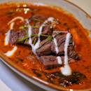 grilled wagyu beef with young coconut meat and siamese cassia curry