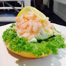 Mount cold water shrimp on a bed of lettuce and egg mayo.