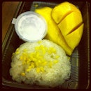Awaiting to board the plane and eating mango sticky rice!