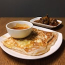 Cheese & Egg Prata, Garlic Prata (foreground), Curry Chicken (background)
