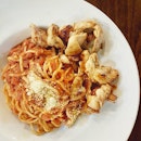 {Spaghetti Arriabata}

Tender chicken chunks with al dente pasta in mildly spicy tomato sauce.