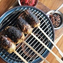 Sate Buntel (Grilled lamb satay) served with rojak achar!