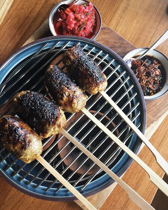 Sate Buntel (Grilled lamb satay) served with rojak achar!