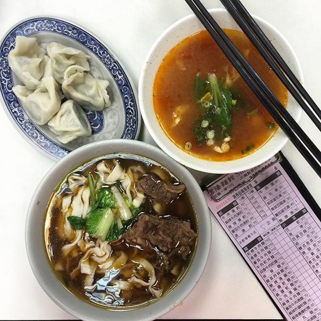 Some braised beef noodles with homemade dumplings and tomato soup.