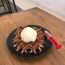 Classic buttermilk waffles with mao shan wang ice cream, drizzled with chocolate sauce.