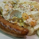 German Bratwurst with Chunky Egg Salad at Icon Village.