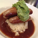 Pork bangers with mashed green pea and potato!