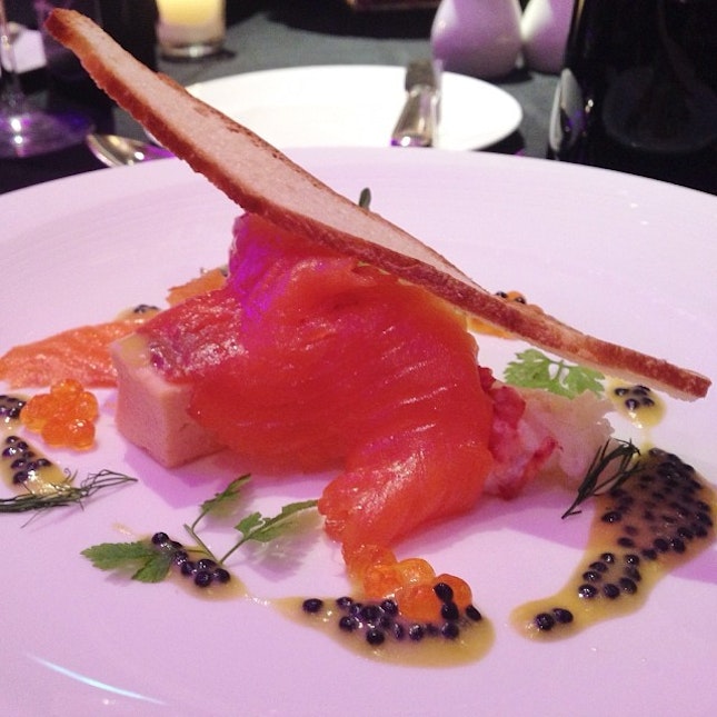 Smoked trout parfait and lobster medallion with avruga caviar dressing.
