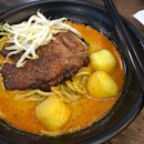 Wholegrain Noodles With Pork Chop & Fishball In Curry ($7.90)