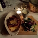 Twice baked cheese soufflé and a glass of French red to start the weekend.
