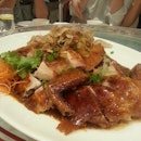 Roasted chicken with ginger, garlic & spicy sauce,  topped with bonito flakes