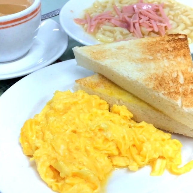 Loving HK's Capital Cafe, it's truffle scrambled eggs and milk tea.
