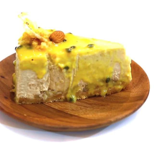 Caramelized banana cheesecake with passionfruit drizzle from Little Favor by Ethel.