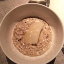 Preserved truffle risotto cooked in white wine and crème fraîche topped with sliced Parmesan.