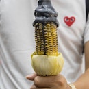 Cream of the Crop 🌽 —
Yep, it’s the weirdest dessert combination I’ve tried thus far - charcoal ice cream and a whole ear of  charred corn.