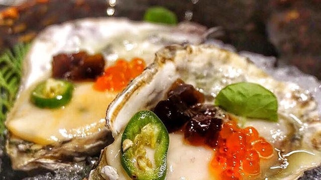 Epic Hiroshima Oysters, delicately dresses up with Ikura, ponzu jelly and Wasabi Foam.