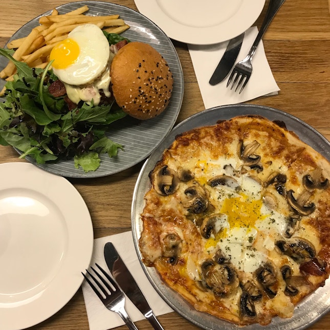 Truffle Scented Mushroom & Egg Pizza ($22), The Assembly Burger ($23)