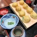 Akashiyaki - the eggy version of takoyaki where one has to dip into the dashi(soup) before eating.