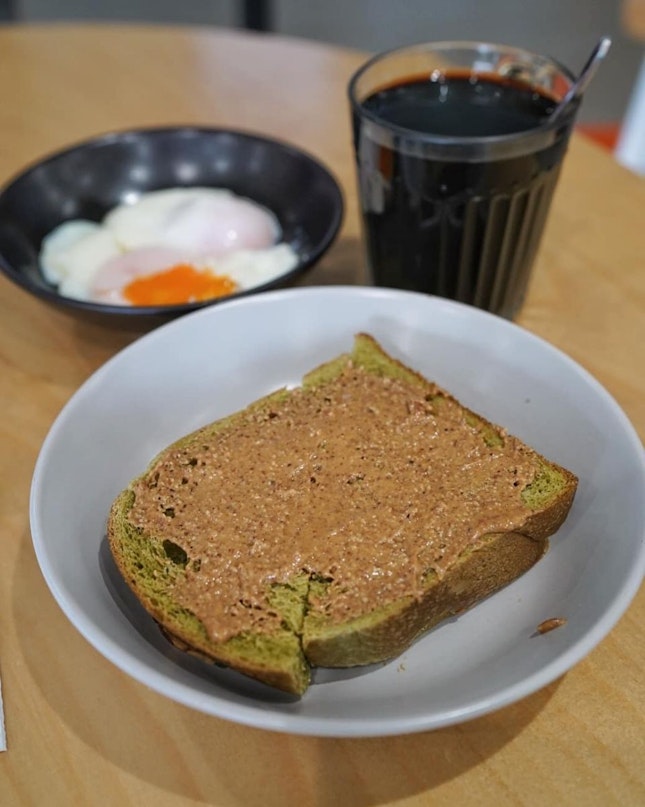 Matcha brioche with Almond spread, half boiled egg and kopi o to accompany my weekend