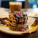 Banana and Peanut Butter Pancakes | burnt caramelised banana slices, housemade peanut butter sauce, toasted peanuts and almonds, Siamaya 75% dark chocolate shaves