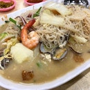 The sweetness of the broth from the seafood with really delicious noodles filled with wok hei...