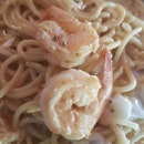 Seafood laksa paste spaghetti with an added side of grilled barramundi.