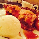 Loving the delicious, warm a apple pie with the creamy and cold ice cream..