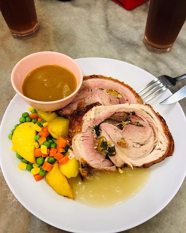 “Little moments can have a feeling and a texture that is very real.”- Ralph Firnnes 
Famous Yut Kee roast pork roulade  with sides of boiled potatoes and peas alongside the onion sauce..