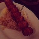 Mini pork sausage wrapped in bacon #bacon #pork #skewer #sausage #meat #delicious #food #foodporn #instafood