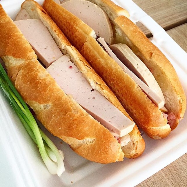 Nom Pang is a Khmer baguette sandwich made up of 2-3 different luncheon meat, ham and processed meat paste?