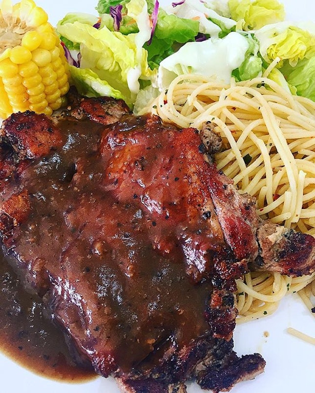Just your typical Kopitiam chicken chop set, obligatory side of salad, pasta infused with garlic and of course that slab of grilled chicken chop slathered with black pepper sauce b