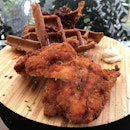 Dreaming about this yummy Fried Chicken & Waffles brunch item @dwworkshop.bistro.retail 🍴😋 The chicken cutlet, fried to a perfect crisp and accompanied by fluffy and freshly made waffles topped with candied bacon bits and maple syrup, was simply AMAZING!