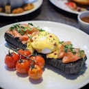 Beet-Cured Salmon [S$16] with poached eggs on charcoal bread.