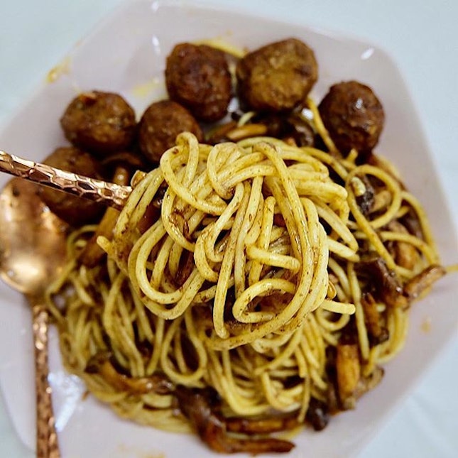 Spaghetti with mushrooms and meatballs tossed in Balsamic Vinegar.