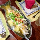 Steamed Seabass in Lime; Head to Ban Khun Mae at Siam for authentic Thai cuisine and experience.