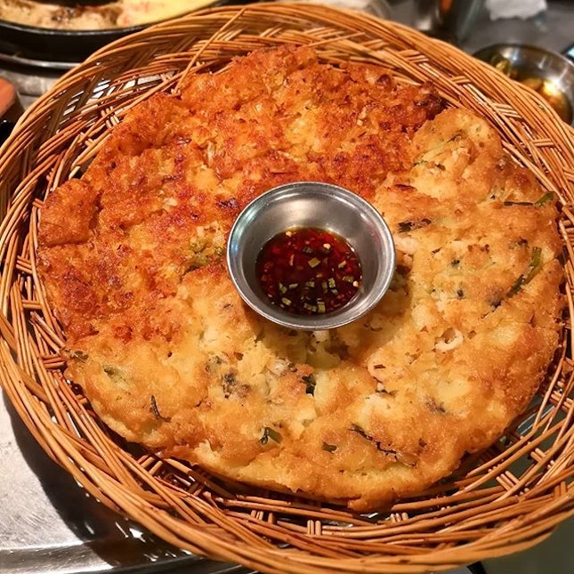 Pancake half half; Enjoy the best of both world with half portion each of kimchi and seafood pancake.