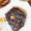 Flame-Grilled Rib-Eye ($19.90, 200g) from @braseiro_sg with unlimited homemade French-fries and lettuces.