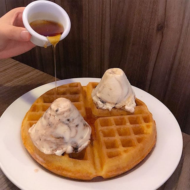 Classic waffles [$8.20] with double scoops [$7.60] - [$15.80] Served with your choice of maple syrup/chocolate sauce and whipped cream(optional), this signature thick Belgian waffles are prepared freshly upon order, along with optional adds-on of ice cream or fruits of your choice.