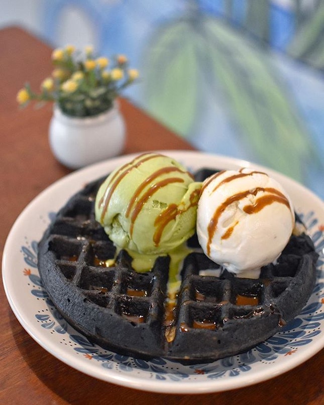Charcoal mochi waffle [$6.70] with Standard double scoops [$6.80] .