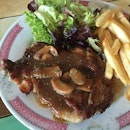 Chicken Chop ($11.50) with a drink
🐔
Grilled chicken leg with mushroom sauce served with fries and salad.