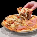 Half Bolognaise and half parma ham pizza ($18)