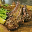 A rack of lamb with a little pink left in the meat, hints of the chargrilling complemented with a tad of curry powder.