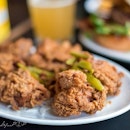 Southern Fried Chicken: Crispy Deep Fried tender Chicken drizzled with Maple Syrup and specked with pickles!